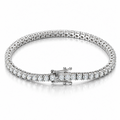 A silver 925  tennis bracelet with a signature clasp, set with moissanite stones.