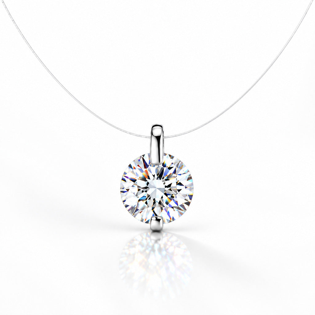 A silver 925 solitaire necklace with a round-cut clear gemstone pendant