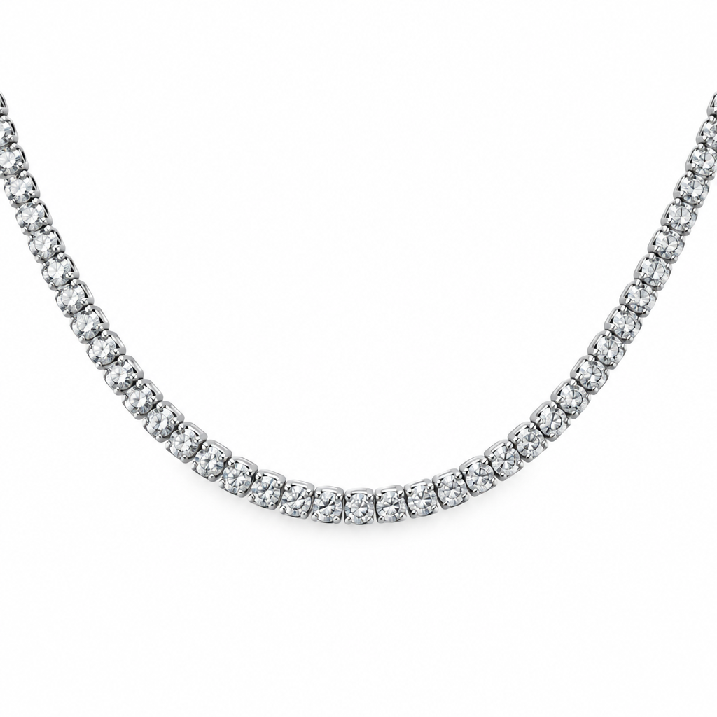 A silver tennis necklace with a continuous row of clear round-cut stones, displayed against a solid white background.